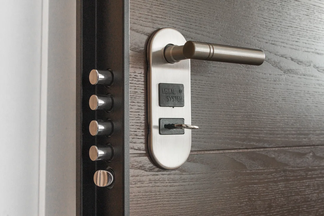 Electronic keypad lock being used on a secured door