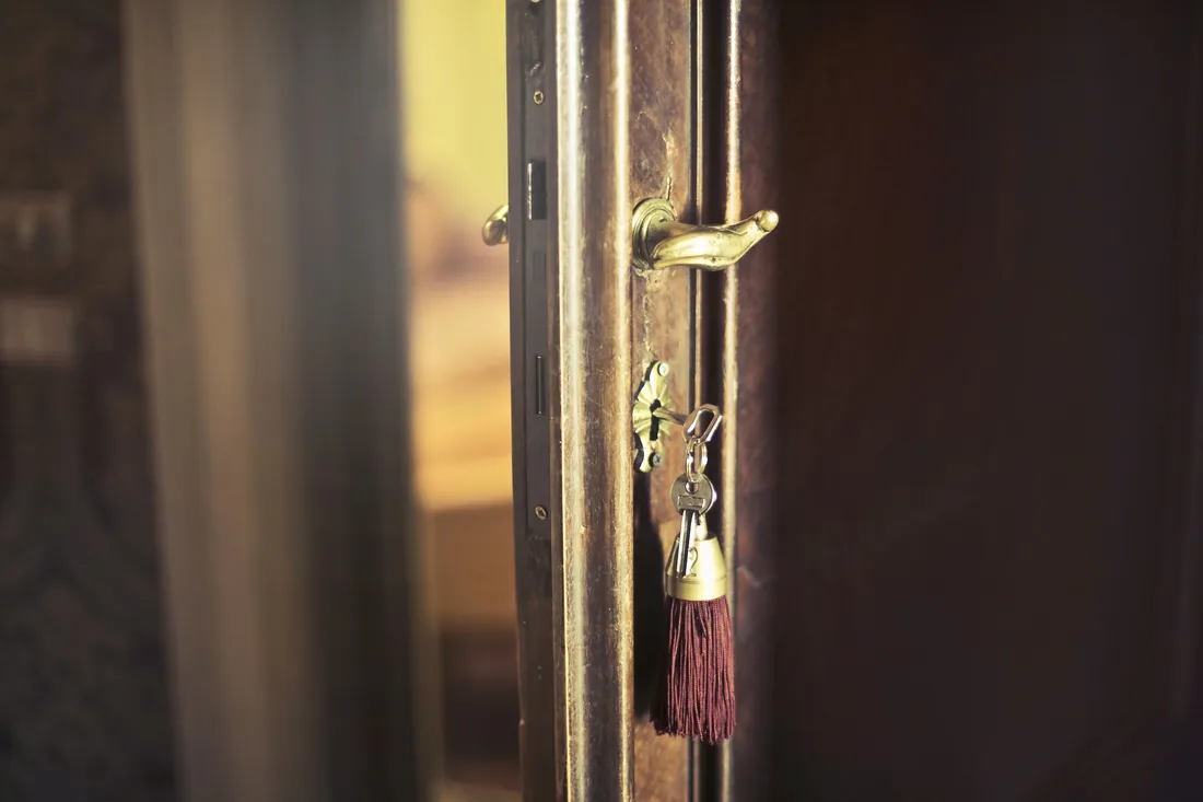 Keys hanging from a locked interior door